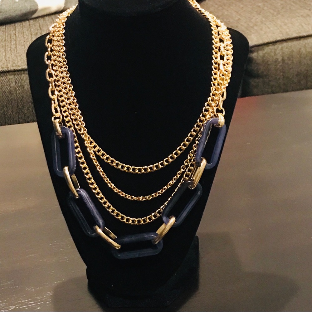 Never worn classy tiered necklace.